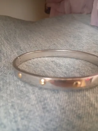 Pulsera acero con piquitos chapado oro