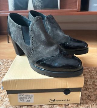 Botines tacón mujer negros y verdes.