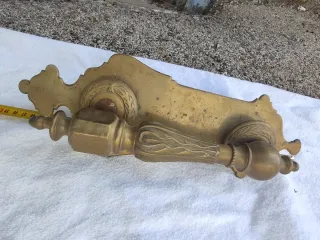Llamador antiguo de bronce