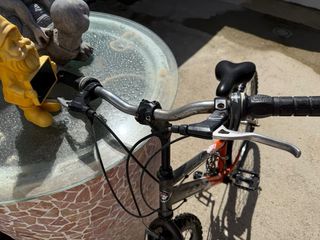 Bicicleta Montaña Naranja y Negra de niño