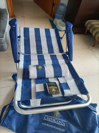 Silla de playa Crevicosta azul y plateada