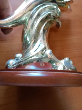 Delfino placcato argento su base