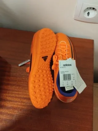 Scarpe da calcio Adidas bambino arancione