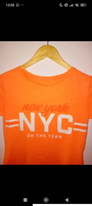 Camiseta H&M NYC Niña Naranja de 9 años aprox