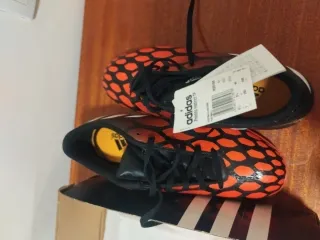 Scarpe da calcio per bambini Adidas arancione/nero