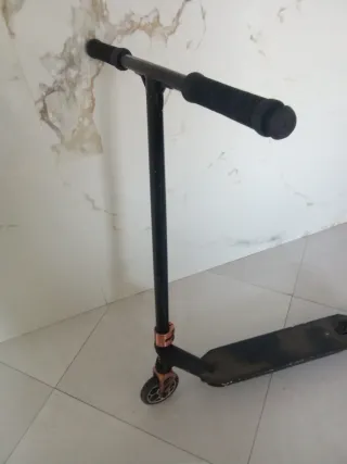 Patinete freestyle negro y cobre