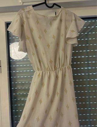 Vestido blanco y dorado