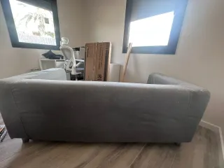 Sofá gris de tela