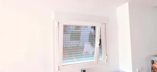 Ventana Climalit Blanca con persiana y oscilo b.