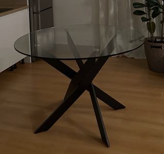 Mesa de comedor redonda de cristal