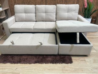Sofá cama beige con arcón