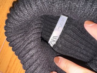 Maglione nero collo alto in lana