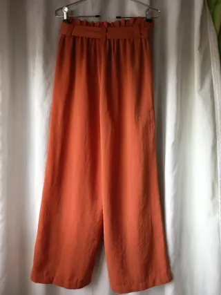 Pantalón naranja ancho mujer