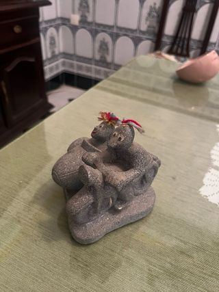 Figura decorativa de piedra