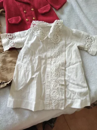 Vestiti per bambole antiche