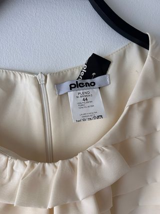 Camisa sin mangas con volantes blanco roto