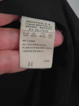 Americana mujer gris con rayas.