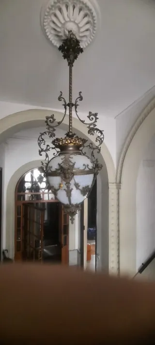 Farol colgante de metal y cristal