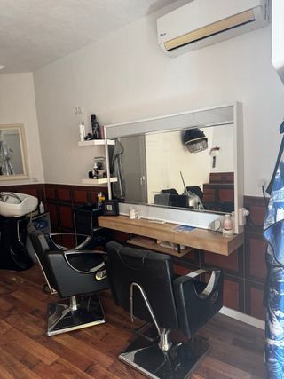 Sillón de peluquería negro