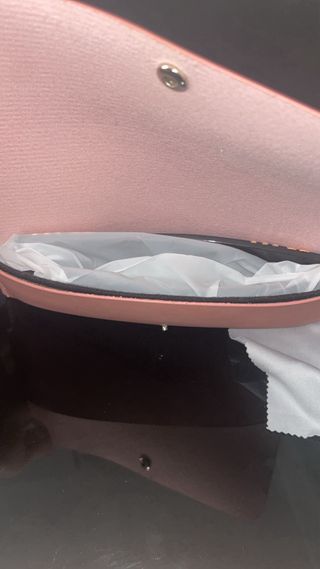 Gafas de sol Miu Miu negras y doradas