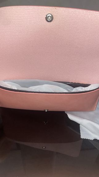 Gafas de sol Miu Miu negras y doradas