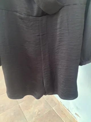 Mono corto negro. T XL. Medidas en descripción