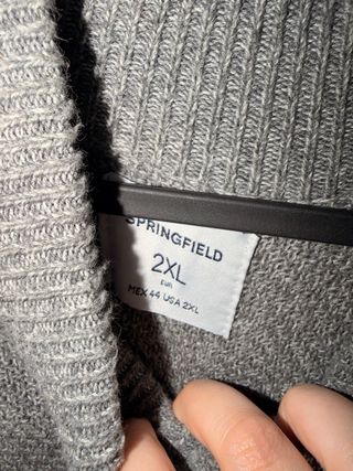 Jersey gris con cremallera