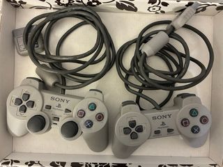 PlayStation 1 Sony gris