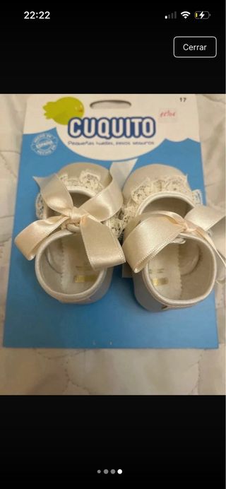 Zapatillas bebé piel blanca con de  lazos satén