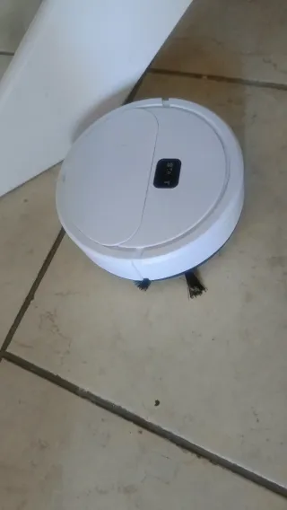 Mini robot aspirapolvere bianco
