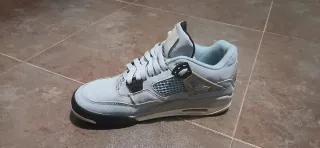 Jordan 4 University Azul