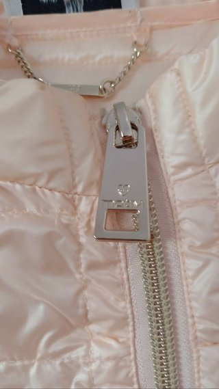 Piumino leggero rosa motivi