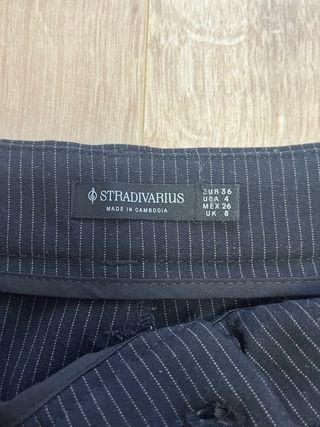 Pantalón traje negro wide leg