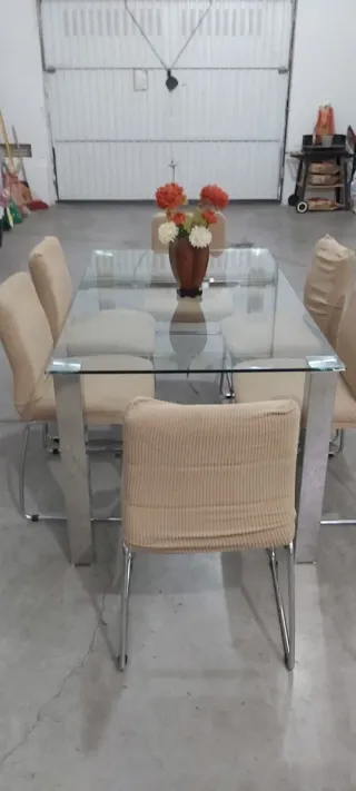 Mesa de cristal y metal con 6 sillas