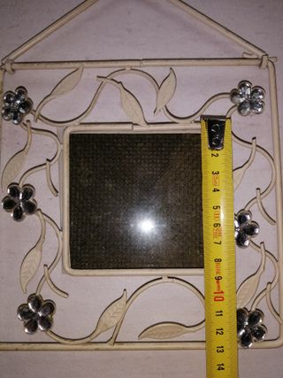 Cornice in ferro decorata con fiori