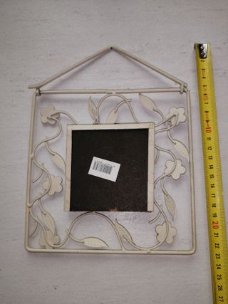 Cornice in ferro decorata con fiori