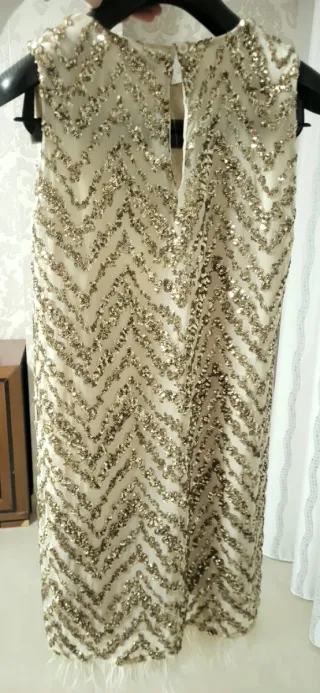 Vestido fiesta lentejuelas y plumas