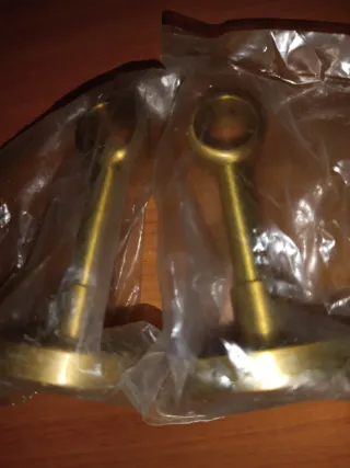 Remates cortinas latón