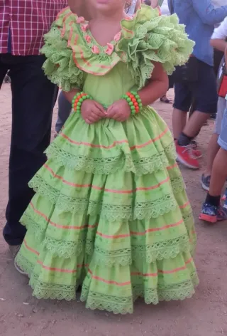 Traje de flamenca verde con volantes