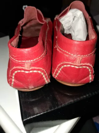 Mocassins de pele vermelhos