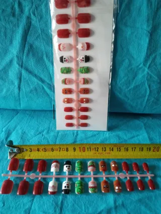 JUEGO DETECTIVES/FIGURAS NEMO/UÑAS POSTIZAS