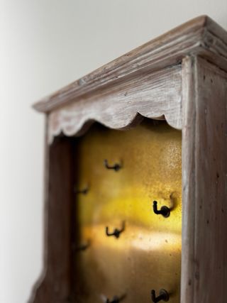 Appendiabiti in legno e metallo