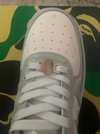 Zapatillas BAPE grises y blancas