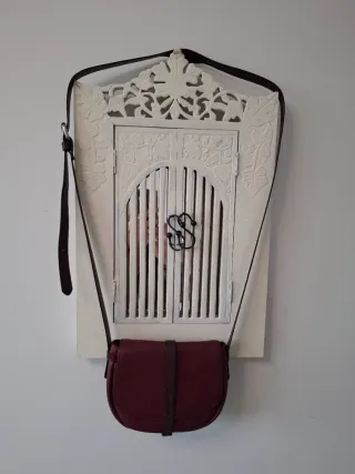 Bolso de piel burdeos