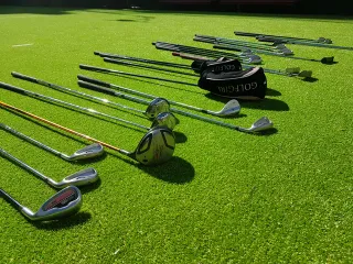 Lote completo golf hombre + mujer + bolsa + 27 pal