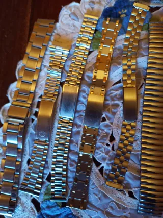 Lotto cinturini orologio oro e argento