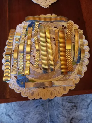 Lotto cinturini orologio oro e argento