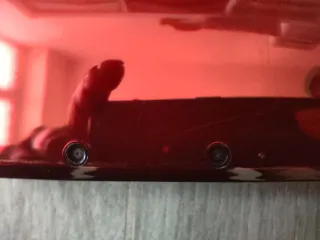 Nintendo 3DS rosso metallico con caricatore