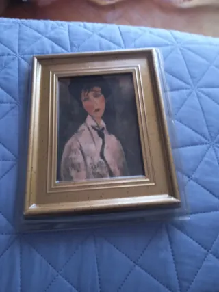 Quadro con cornice dorata sigillato