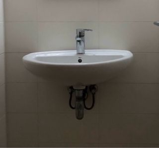 Lavabo de cerámica blanco